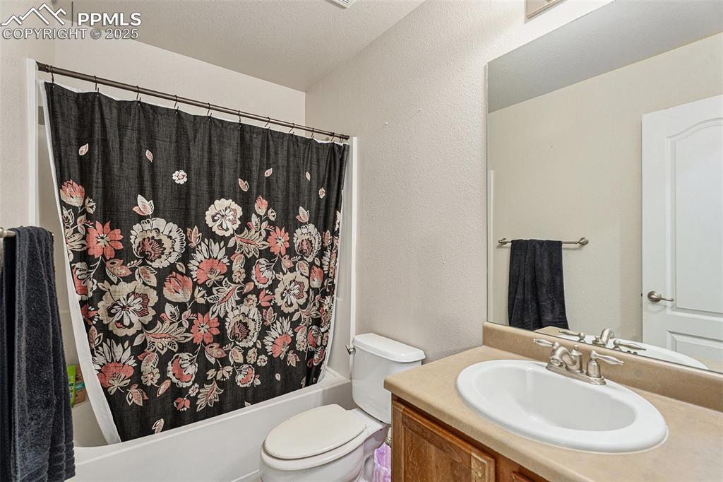Image 20 of 30: Full bathroom located in primary bedroom.
