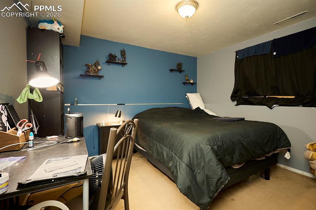 Image 23 of 34: Bedroom