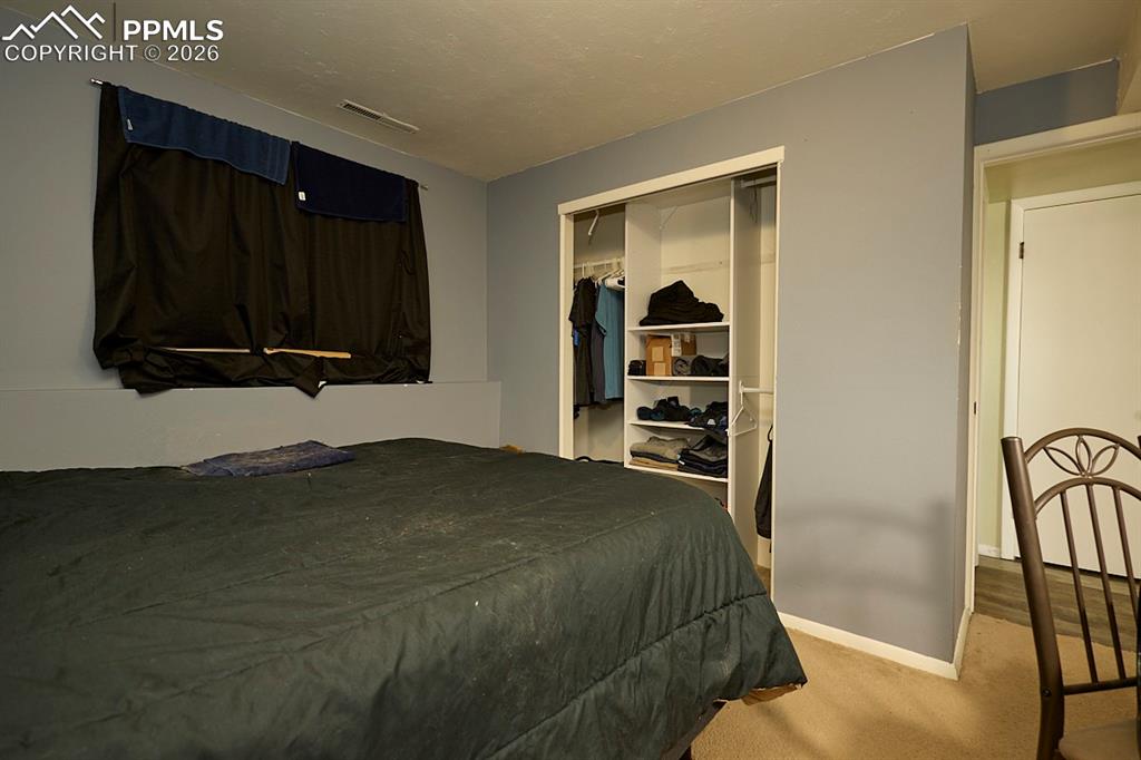 Image 24 of 34: Bedroom