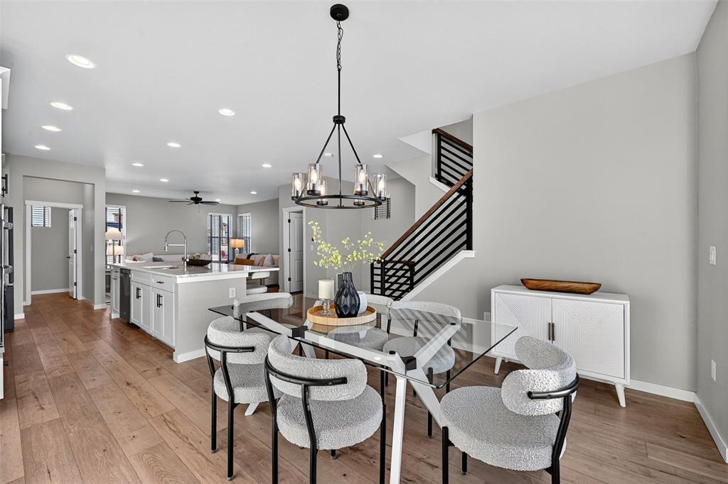 Image 10 of 32: Upgraded lighting and spacious dining area!