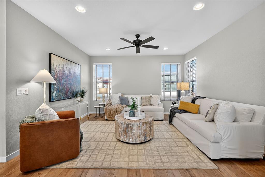 Image 11 of 32: Large living room with tall ceilings