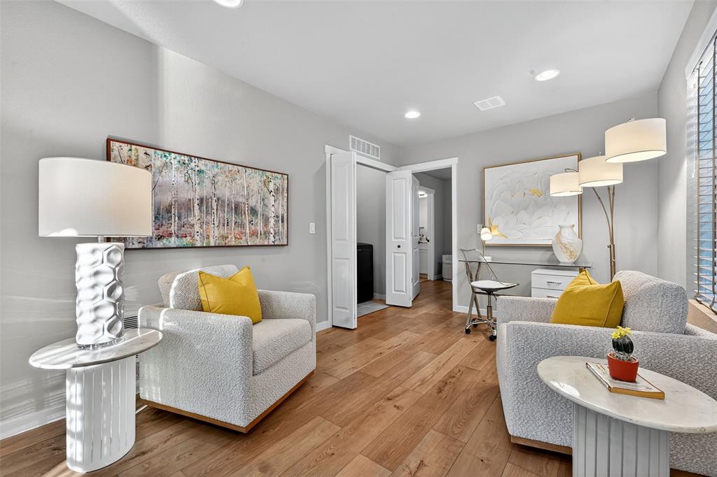 Image 14 of 32: Loft/ Flex space with laminate flooring and laundry