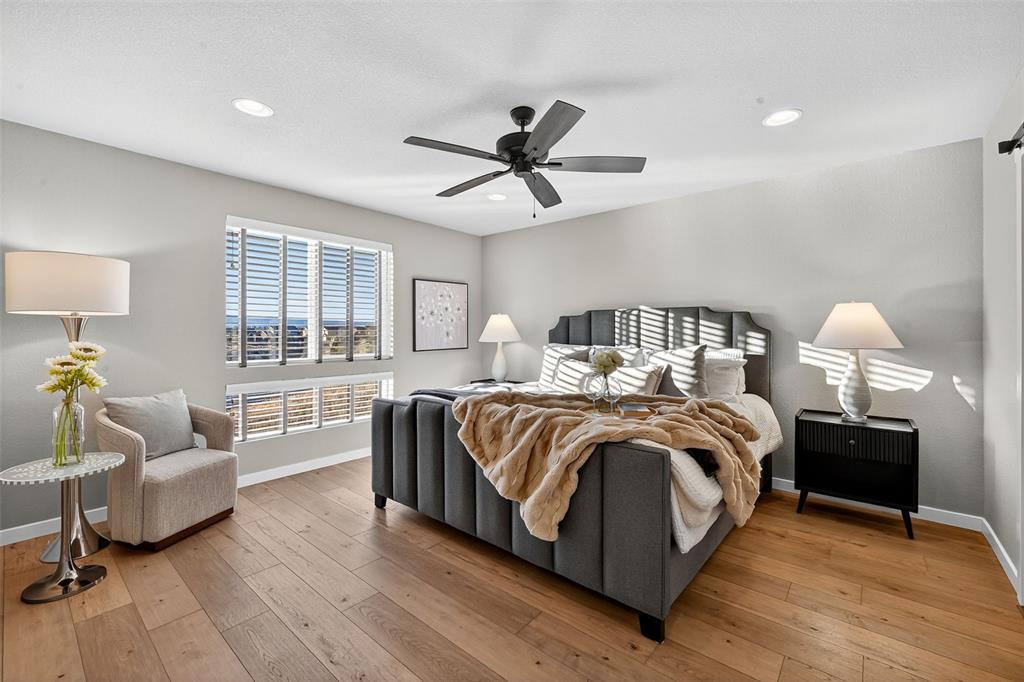 Image 16 of 32: Large Master Bedroom with views of Pikes Peak