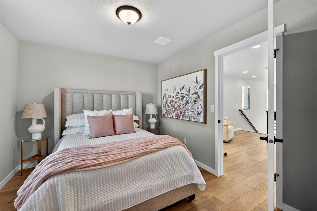 Image 20 of 32: Bedroom with access from the loft and en-suite bathroom