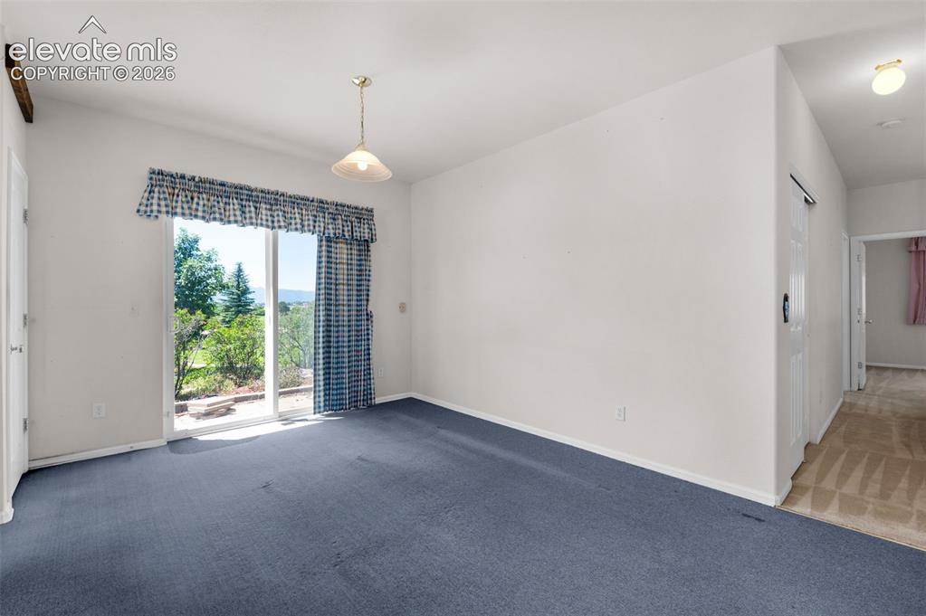 Image 11 of 46: Dining Area in the Eat-In Country Kitchen with Walk-Out to the Patio and Ba