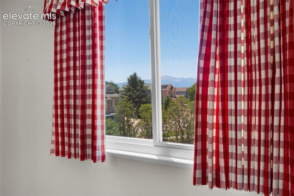 Image 16 of 46: Pikes Peak View From Primary Bedroom Window