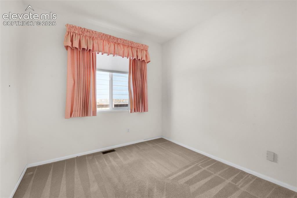 Image 19 of 46: Second Bedroom
