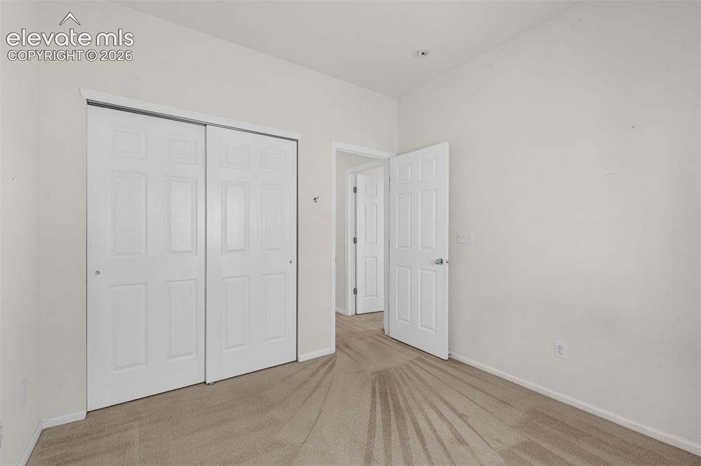 Image 20 of 46: Second Bedroom Viewing to Hallway