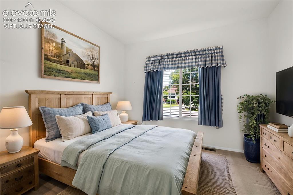 Image 22 of 46: Virtually Staged Photo... Third Bedroom Located Off of the Living Room, Fea