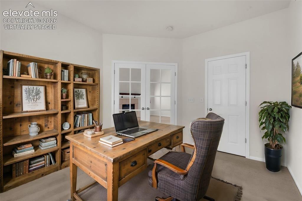 Image 24 of 46: Virtually Staged Photo... Third Bedroom Shown as Office Located Off of the 