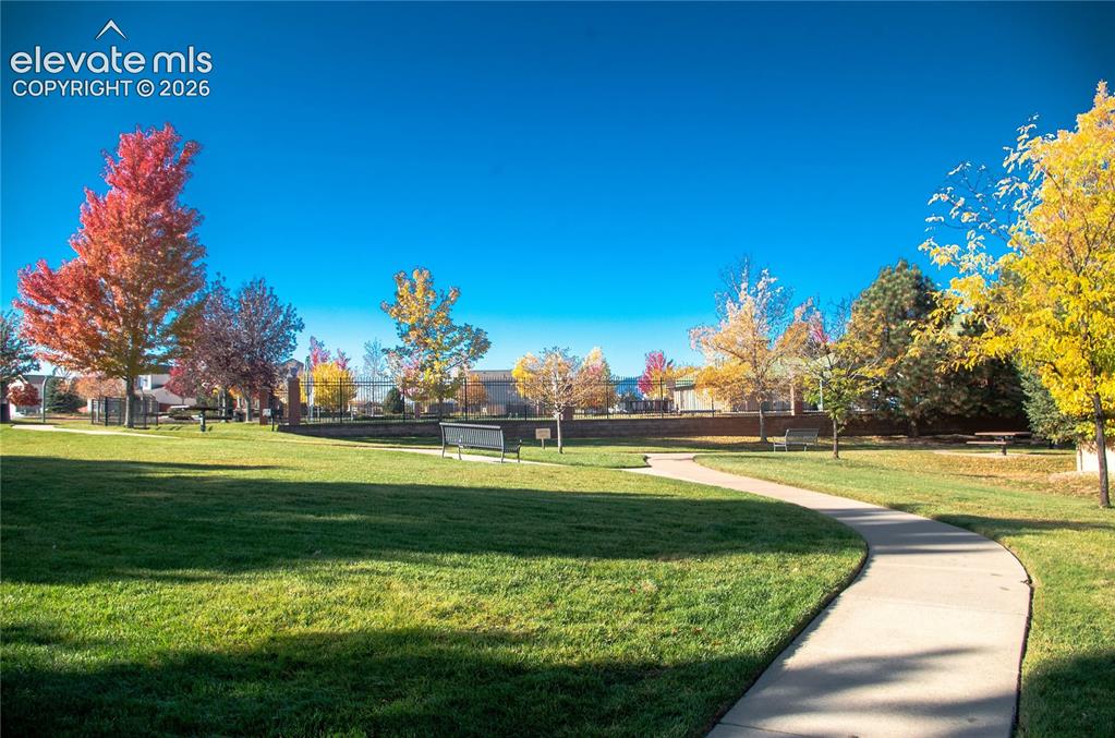 Image 38 of 46: Walking Path Sidewalk Going to the Pool and Tennis Courts