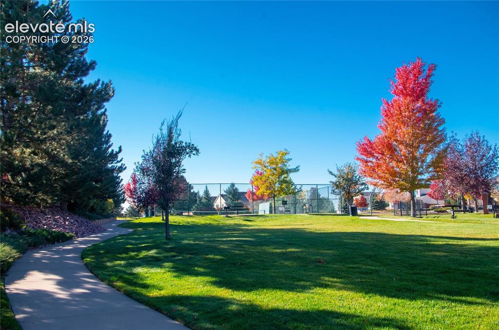 Image 40 of 46: Walking Path Sidewalk Going to the Tennis Courts