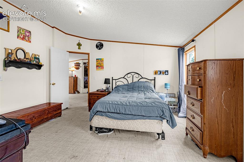Image 13 of 38: Master Bedroom