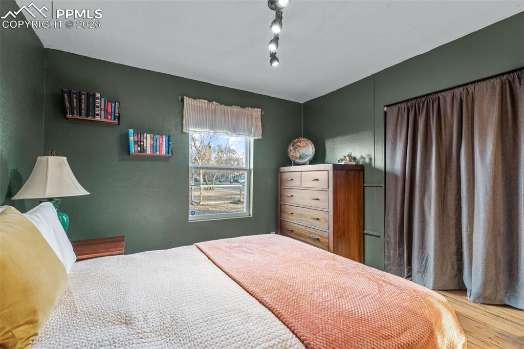 Image 19 of 37: Bedroom featuring wood finished floors