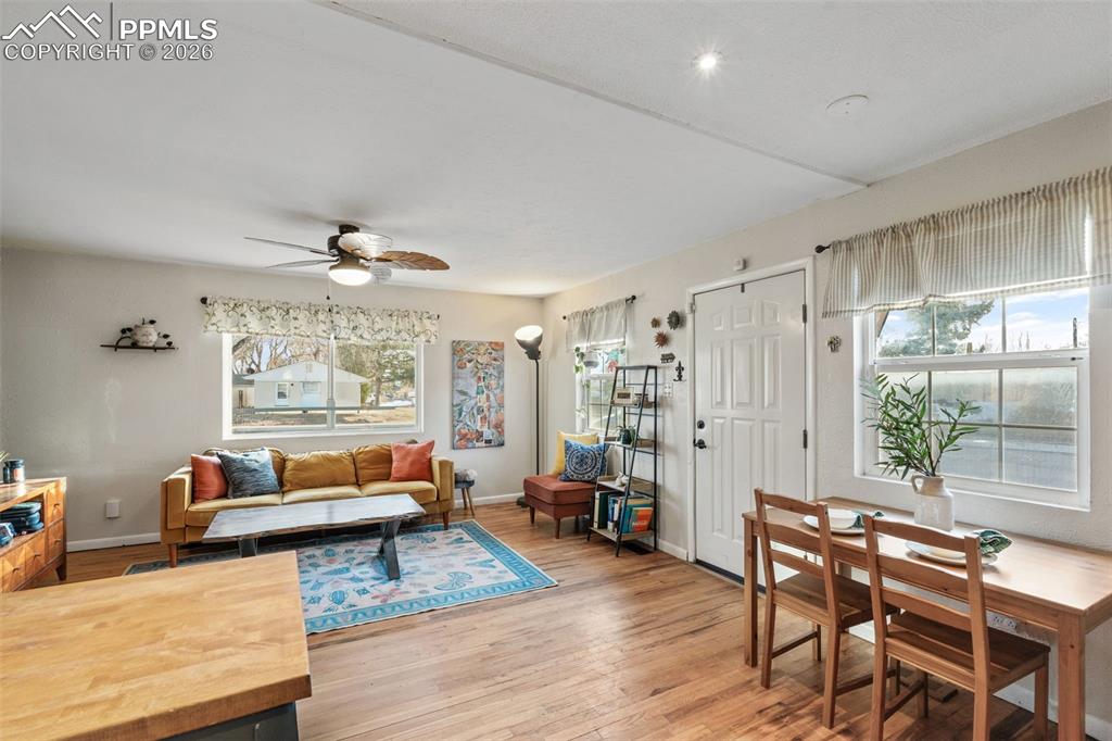 Image 3 of 37: Living room featuring a ceiling fan and light wood finished floors