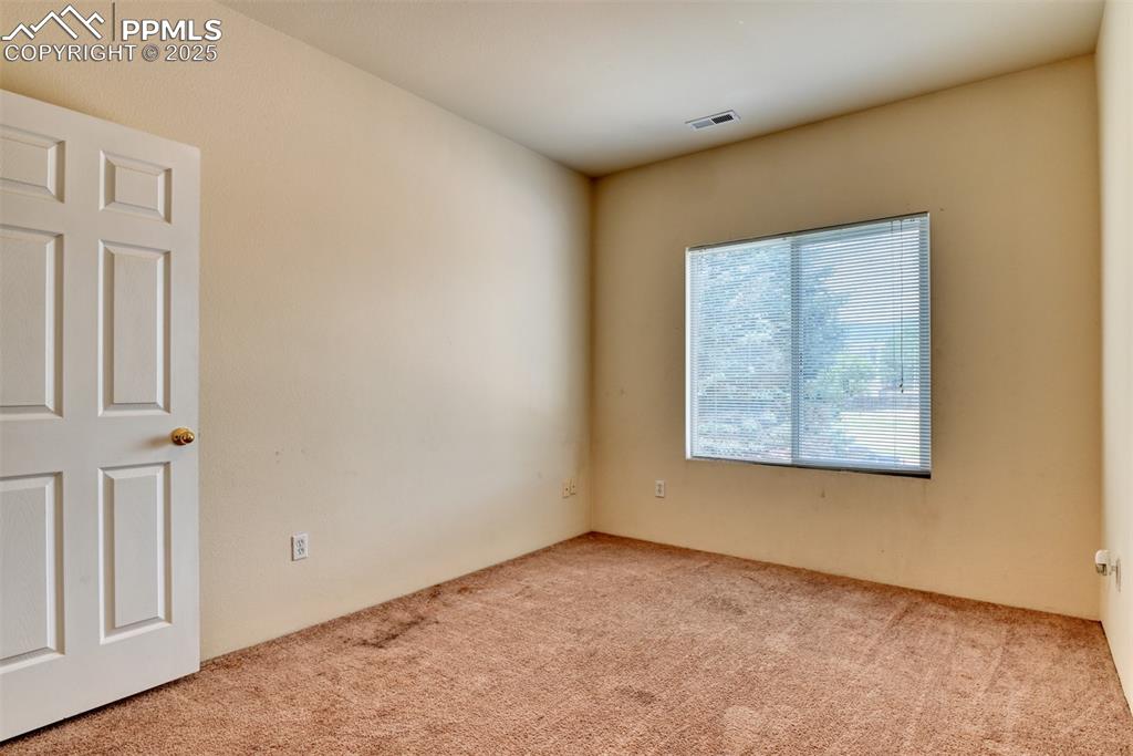 Image 25 of 32: View of carpeted spare room