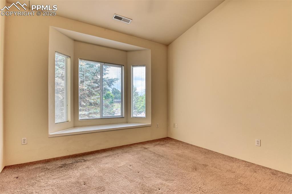 Image 27 of 32: View of carpeted empty room