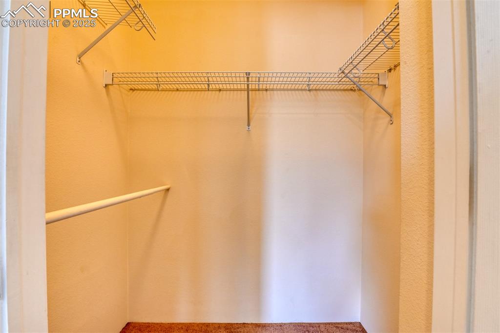 Image 32 of 32: View of walk in closet