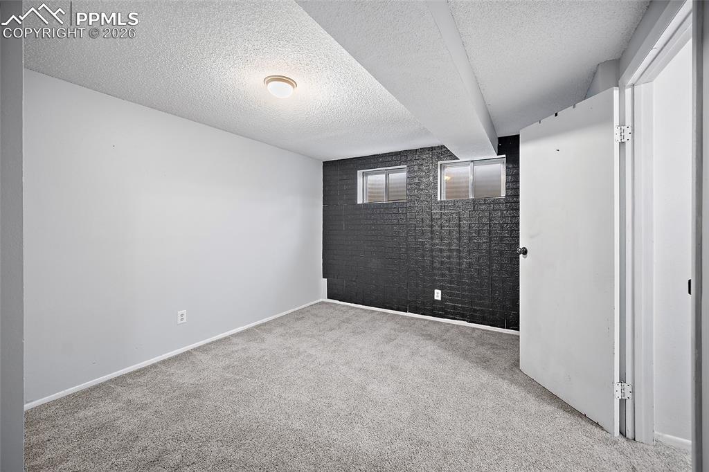 Image 42 of 50: Basement bedroom #1