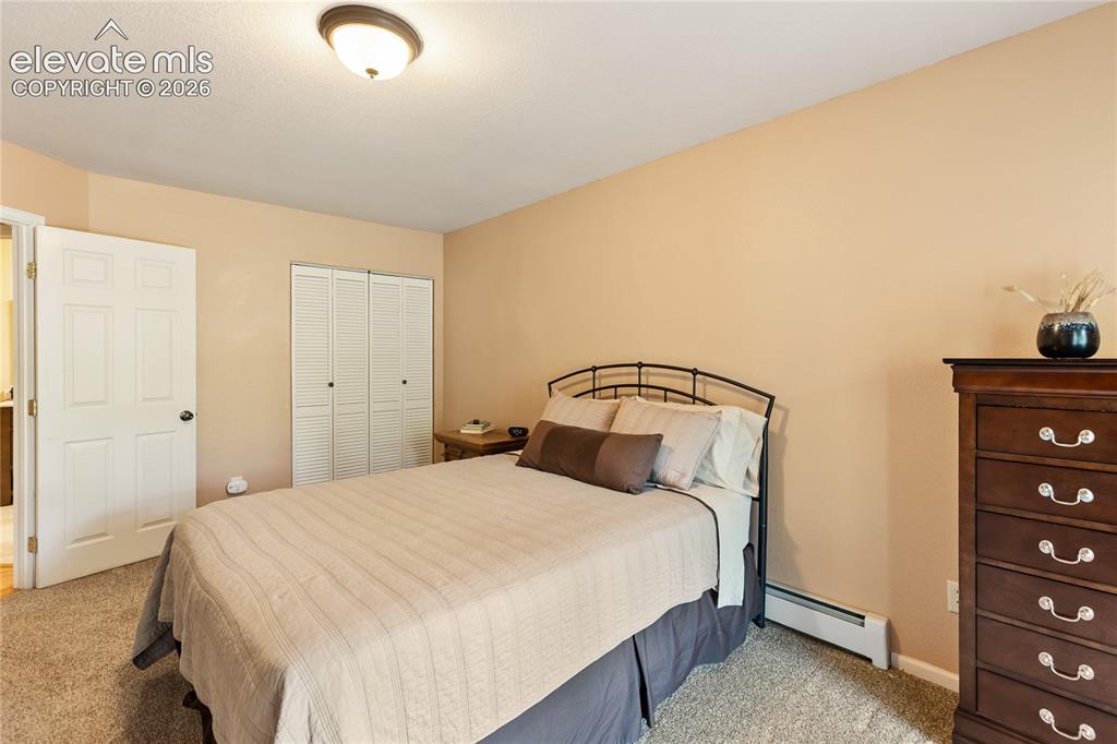 Image 21 of 40: Carpeted interior room featuring neutral wall tones