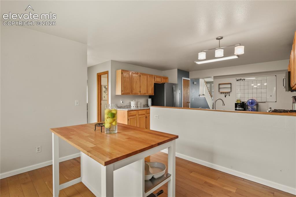 Image 12 of 50: Breakfast nook off kitchen