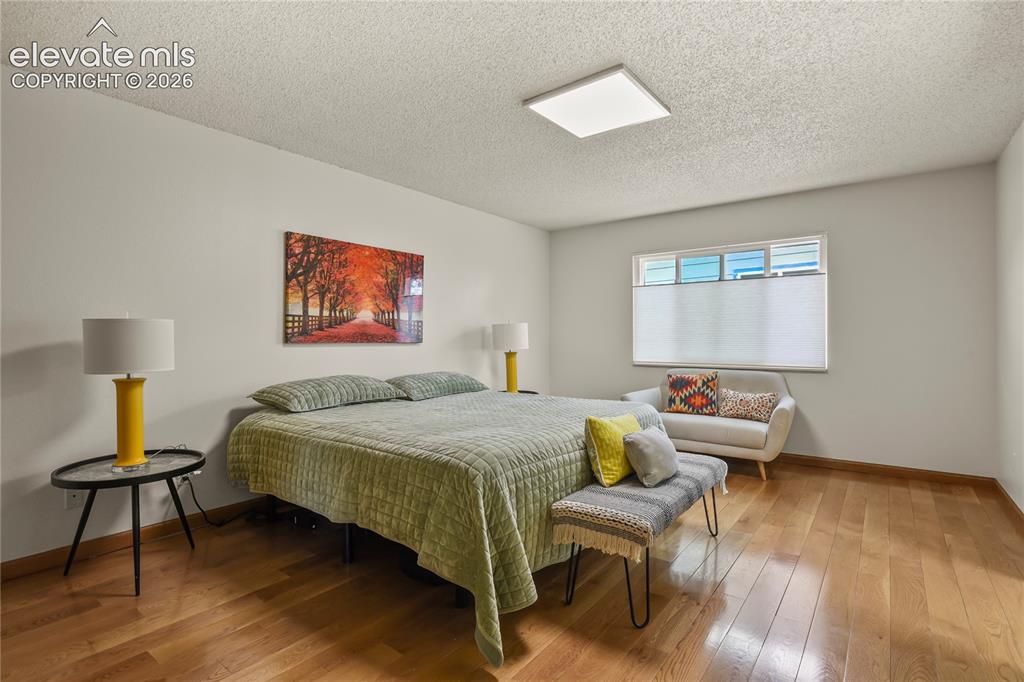 Image 19 of 50: Main level Primary suite