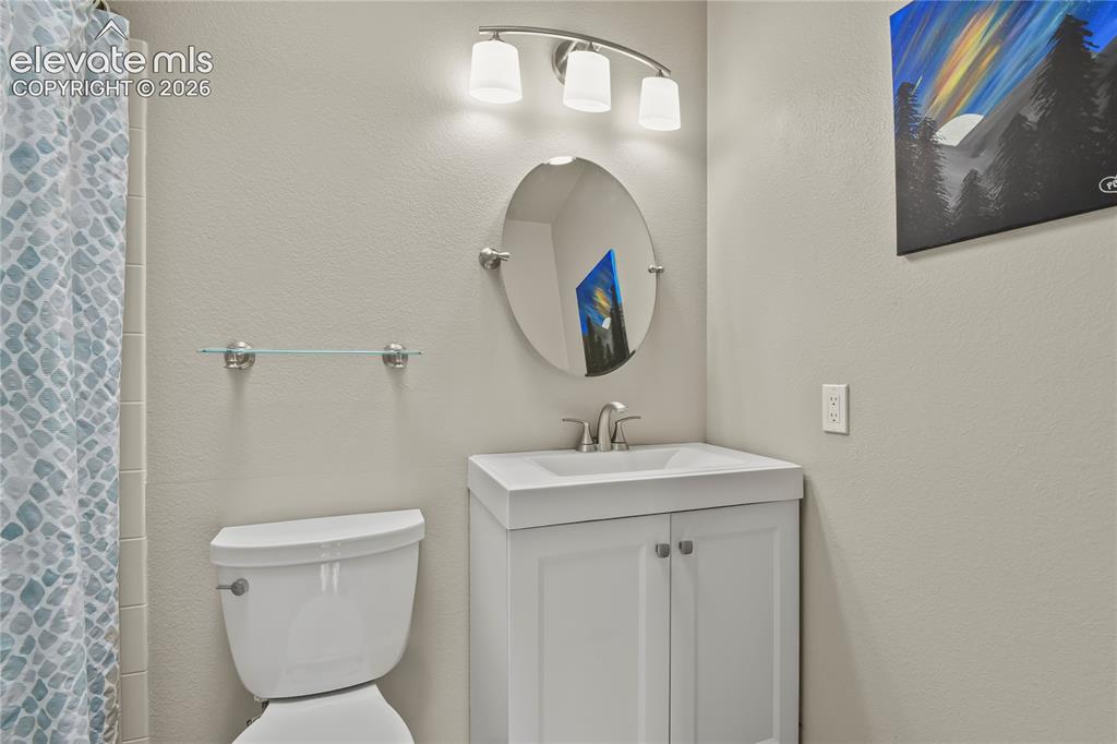 Image 30 of 50: Upper level full, hall bathroom