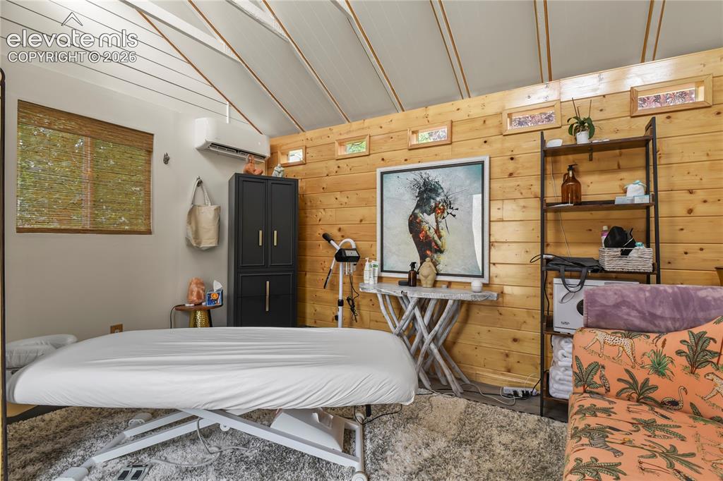 Image 41 of 50: Currently used as massage studio with mini-split