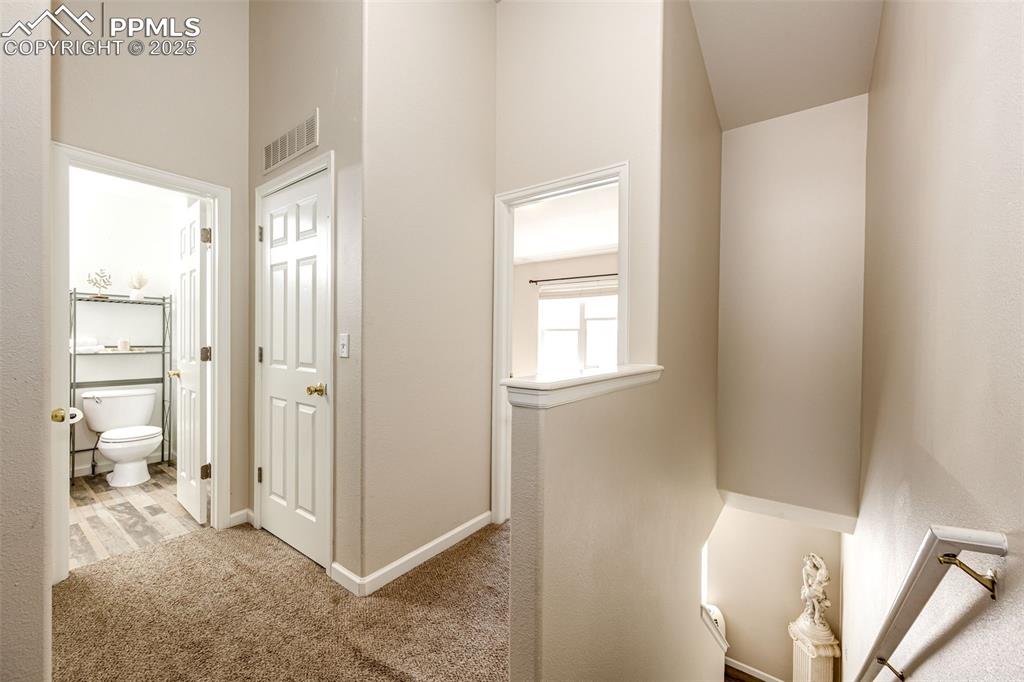 Image 15 of 34: Upper landing with laundry facilities