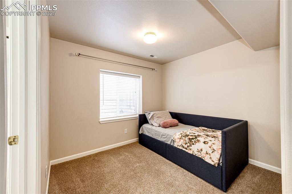 Image 21 of 34: basement bedroom with private ensuite