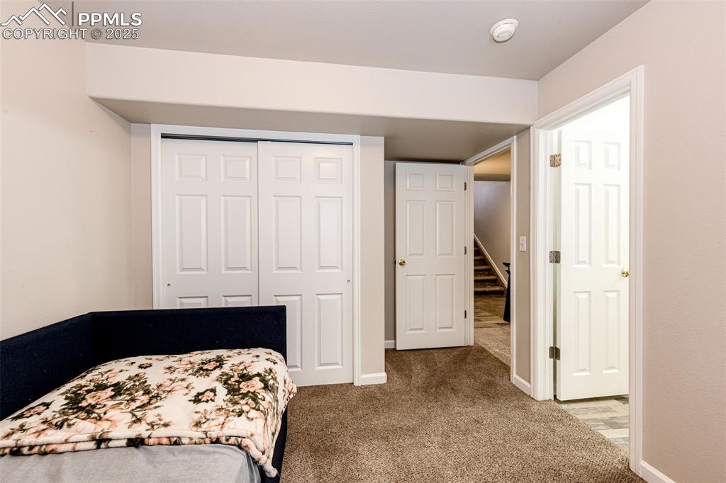 Image 22 of 34: basement bedroom with private ensuite