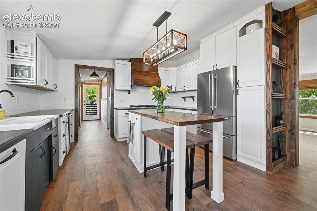 Image 13 of 44: Eat In Kitchen has all the upgrades-Deep Kitchen Sink looks out over backya