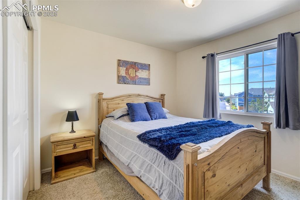 Image 21 of 41: Guest Bedroom, new carpet since photo