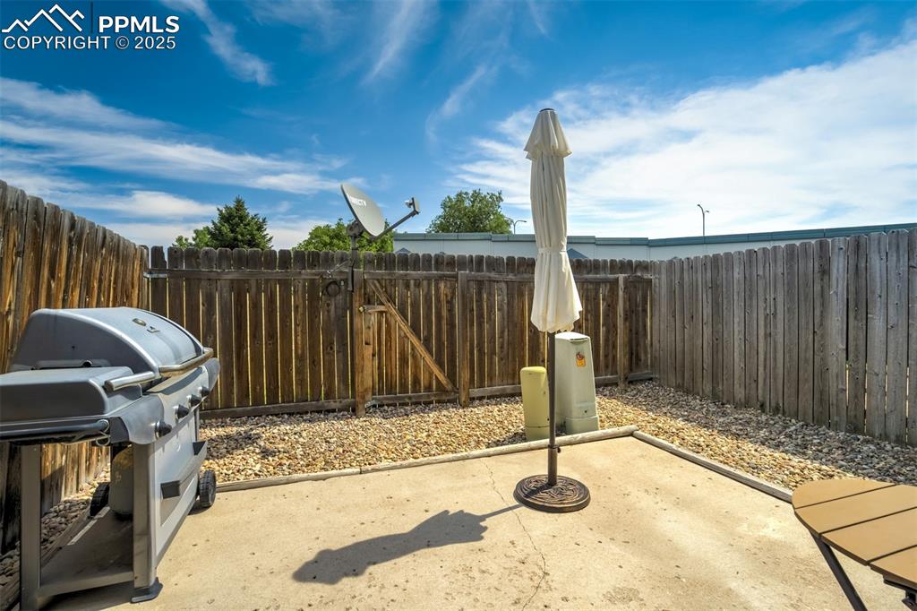 Image 34 of 41: Notice gate to trail path