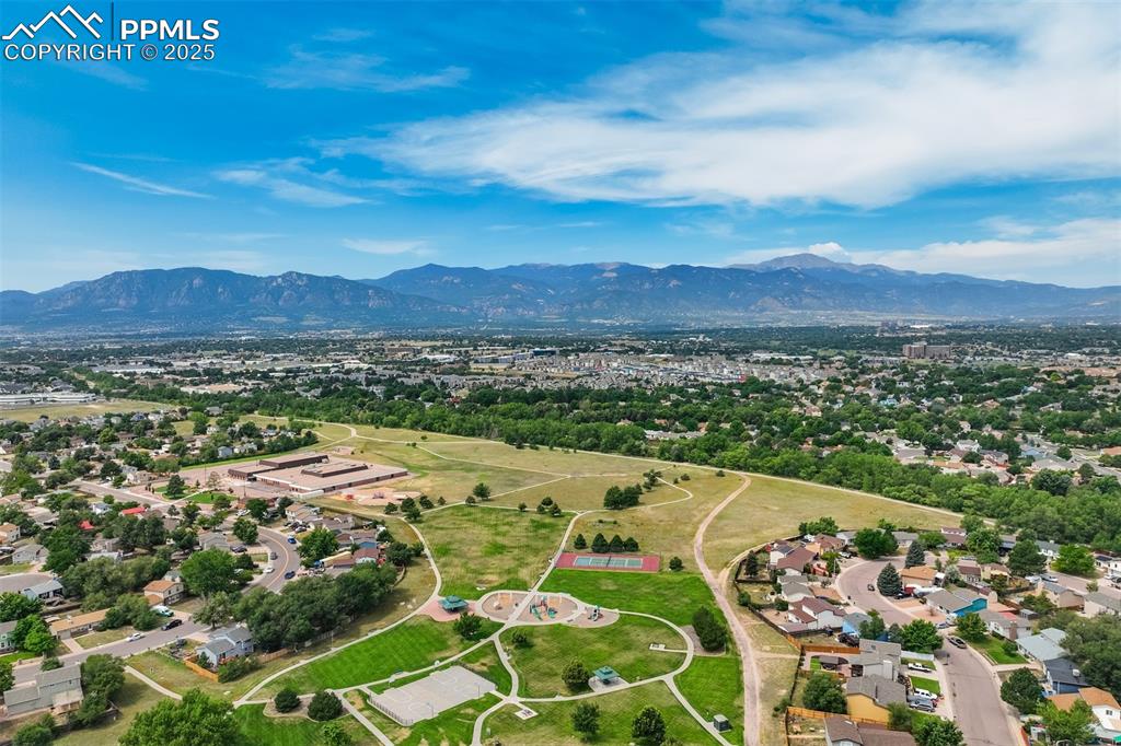 Image 36 of 41: Blding is next to trail path, guest parking just to left and directly acros