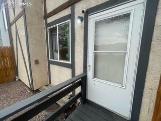 Image 2 of 30: View of side of property with fence