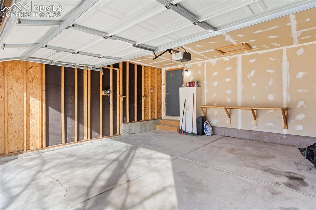 Image 17 of 18: The tub/shower in the full hall bath.