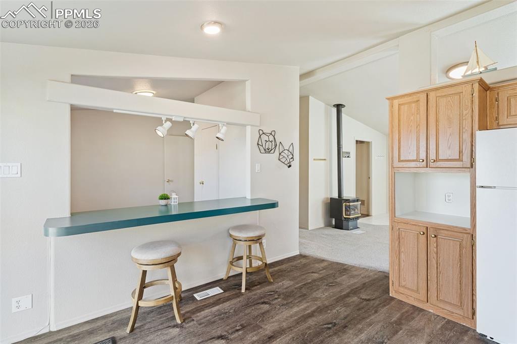 Image 7 of 18: Enjoy the warmth of this gas stove on those cold winter days.