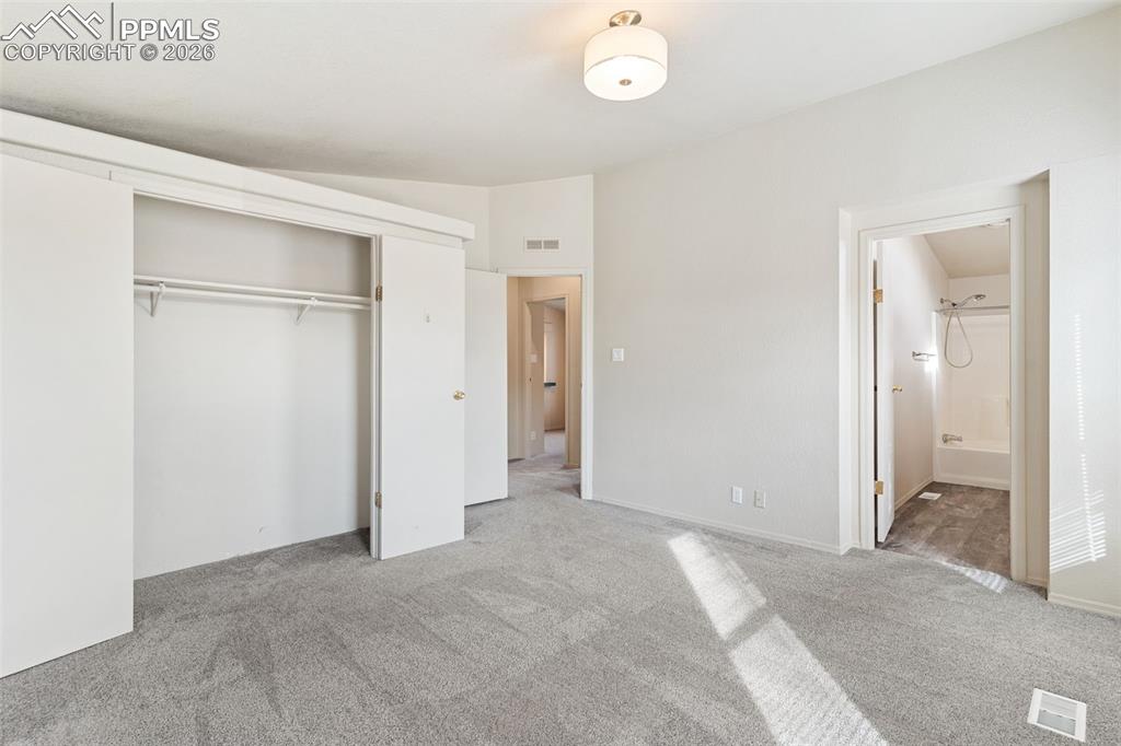 Image 9 of 18: This great kitchen provides ample cupboards and counter space, plus a gas r