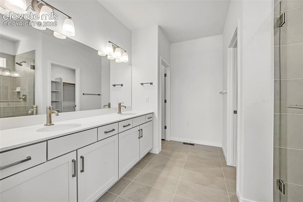 Image 10 of 23: Primary Bathroom