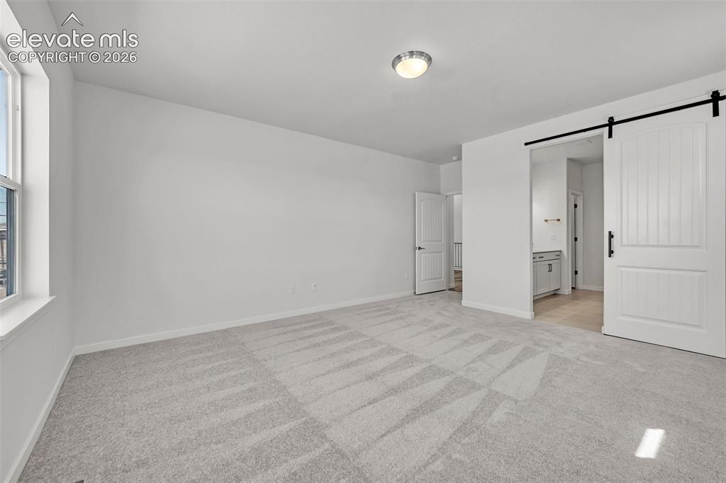 Image 9 of 23: Primary Bedroom