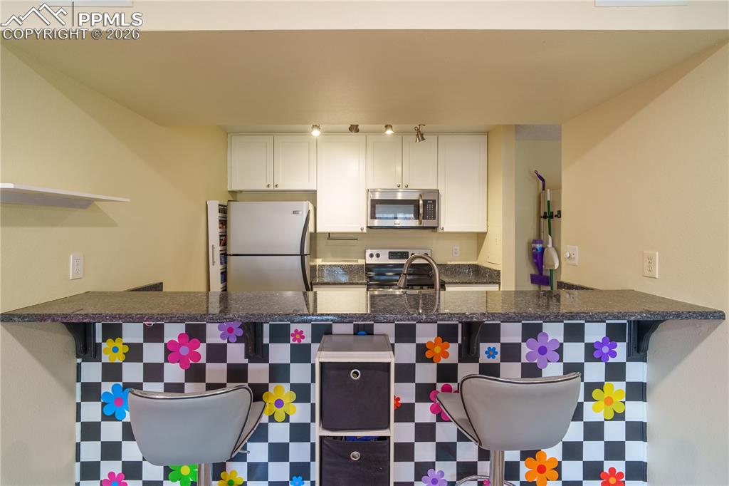 Image 4 of 13: Kitchen