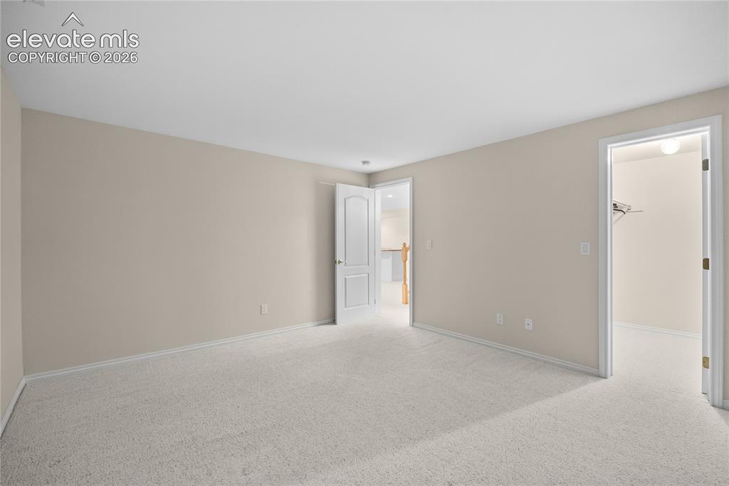 Image 27 of 41: Basement bedroom.