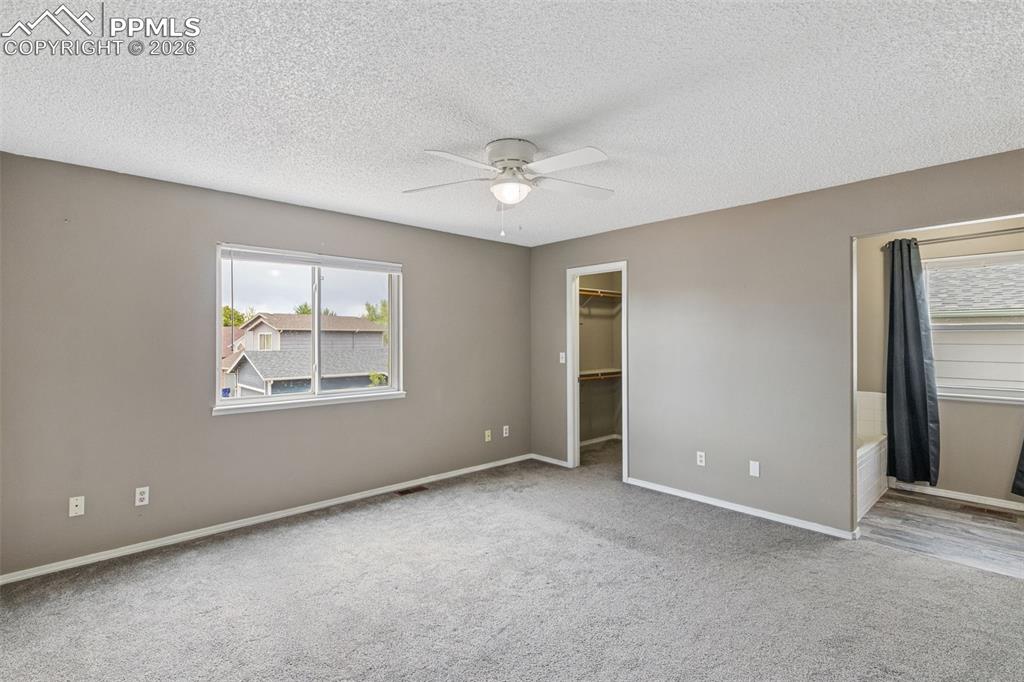Image 14 of 32: "Virtually Staged" basement bedroom