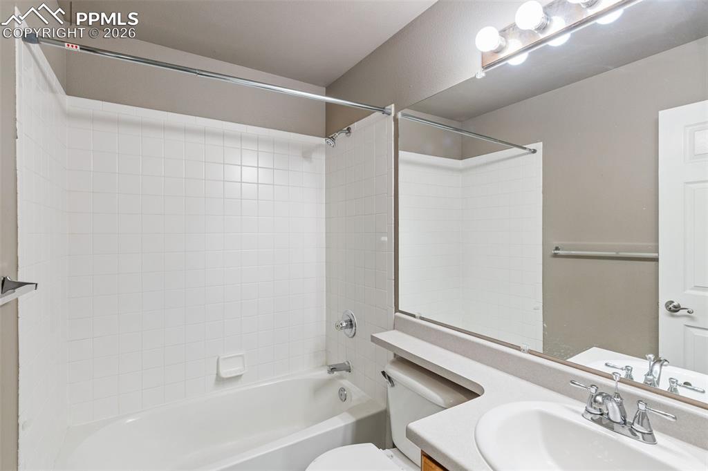 Image 16 of 32: Upper primary bedroom suite, attached bathroom, walk-in closet