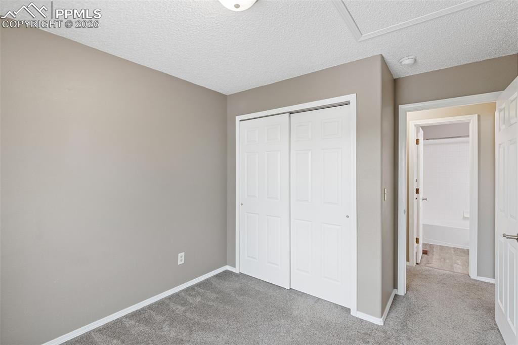 Image 24 of 32: Gas fireplace, great room with a vaulted ceiling