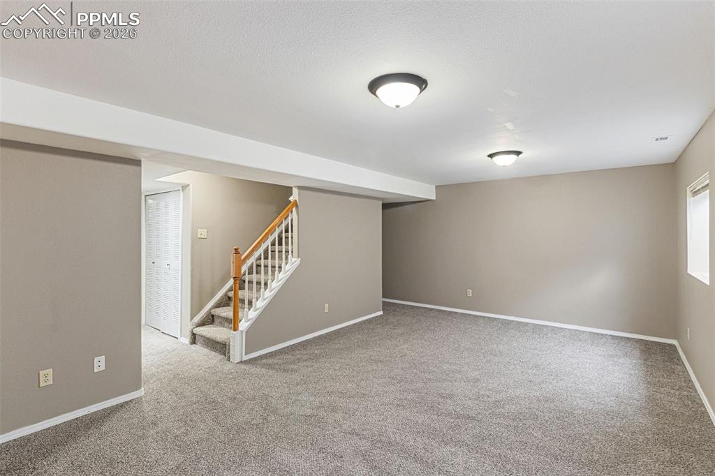 Image 29 of 32: finished basement