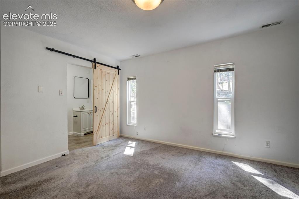 Image 12 of 43: Master Bedroom