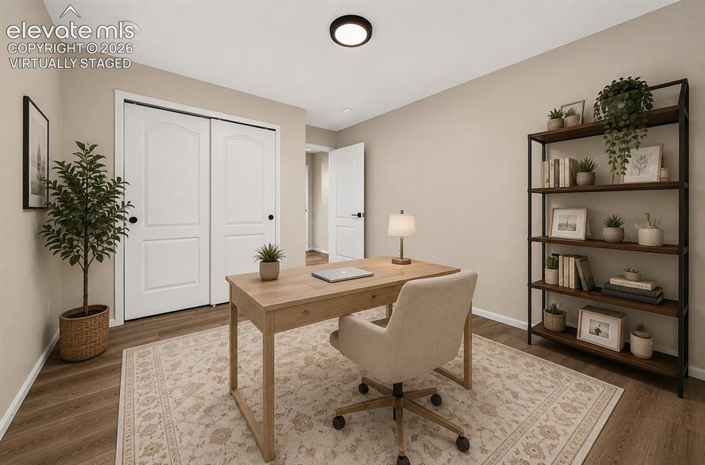 Image 23 of 32: Virtually staged upstairs office