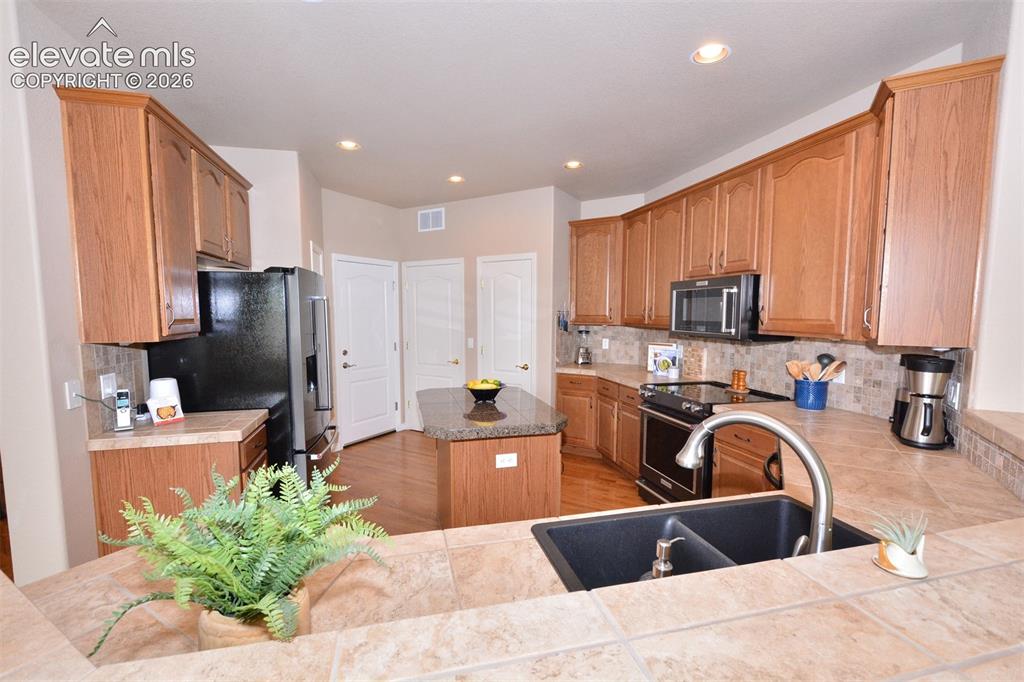 Image 10 of 34: 2nd Laundry Hookup in Kitchen